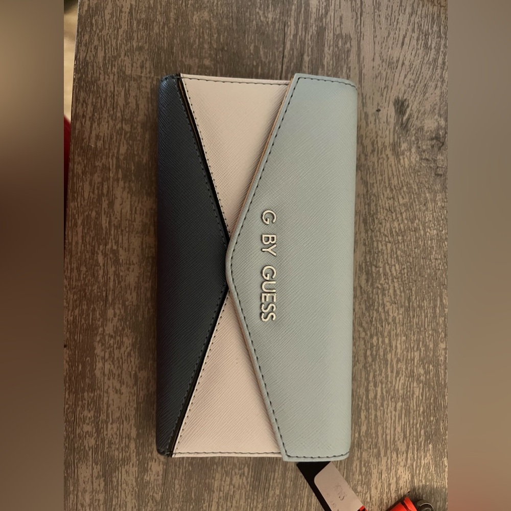 Guess / brand new / soft colors / never used